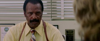 Movie still from “Starsky & Hutch” (2004), directed by Todd Phillips – A person wearing a shirt and a tie; Close Up shot, Low angle