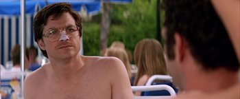 Movie still from “Starsky & Hutch” (2004), directed by Todd Phillips – A man sitting on a chair in the sun; Close Up shot, Over the shoulder angle