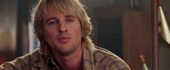 Movie still from “Starsky & Hutch” (2004), directed by Todd Phillips – A person with long blonde hair; Close Up shot, Over the shoulder angle