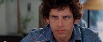 Movie still from “Starsky & Hutch” (2004), directed by Todd Phillips – A person wearing a jean jacket; Close Up shot, Over the shoulder angle