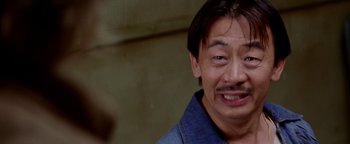 Movie still from “Starsky & Hutch” (2004), directed by Todd Phillips – A person with long hair; Close Up shot, Over the shoulder angle