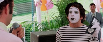 Movie still from “Starsky & Hutch” (2004), directed by Todd Phillips – Mime in striped shirt and black and white hat; Close Up shot, Over the shoulder angle