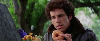 Movie still from “Starsky & Hutch” (2004), directed by Todd Phillips – Ben stiller holding a doughnut; Close Up shot, Over the shoulder angle