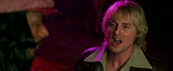 Movie still from “Starsky & Hutch” (2004), directed by Todd Phillips – A person wearing a leather jacket; Close Up shot, Low angle
