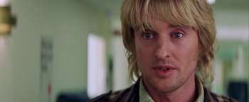 Movie still from “Starsky & Hutch” (2004), directed by Todd Phillips – A person with long blonde hair; Close Up shot, Over the shoulder angle