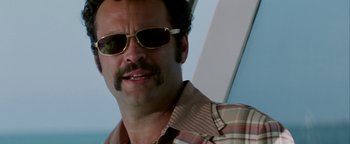 Movie still from “Starsky & Hutch” (2004), directed by Todd Phillips – A person wearing sunglasses; Close Up shot, Low angle