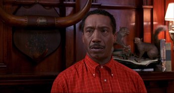 Movie still from “State and Main” (2000), directed by David Mamet – A person wearing a red shirt; Close Up shot, Low angle