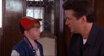 Movie still from “State and Main” (2000), directed by David Mamet – A man and a boy talking to each other; Close Up shot, Over the shoulder angle
