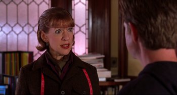 Movie still from “State and Main” (2000), directed by David Mamet – A woman talking to a man in front of a window; Close Up shot, Over the shoulder angle