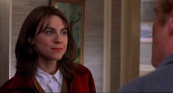 Movie still from “State and Main” (2000), directed by David Mamet – A person wearing a red jacket; Close Up shot, Over the shoulder angle