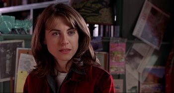 Movie still from “State and Main” (2000), directed by David Mamet – A person with long hair; Close Up shot, Over the shoulder angle