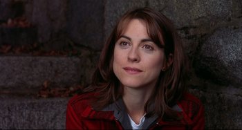 Movie still from “State and Main” (2000), directed by David Mamet – A person wearing a red jacket; Close Up shot, Over the shoulder angle