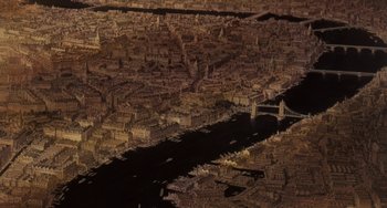 Movie still from “Steamboy” (2004), directed by Shinji Takagi – An aerial view of a city with a bridge in the center; Extreme Wide shot, Overhead angle
