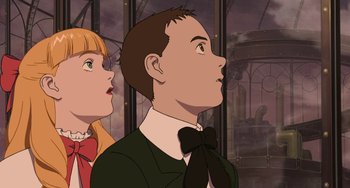 Movie still from “Steamboy” (2004), directed by Shinji Takagi – A man and a woman looking up at something; Close Up shot, Low angle