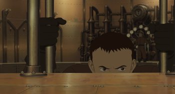 Movie still from “Steamboy” (2004), directed by Shinji Takagi – A man looking over a table in a room with pipes in the background; Close Up shot, High angle