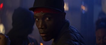 Movie still from “Step Up” (2006), directed by Anne Fletcher – A person wearing a hat; Close Up shot, Over the shoulder angle