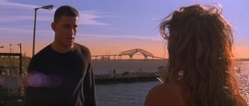 Movie still from “Step Up” (2006), directed by Anne Fletcher – A man and a woman looking out over a body of water; Medium shot, Over the shoulder angle