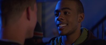 Movie still from “Step Up” (2006), directed by Anne Fletcher – A person smiling at the camera; Close Up shot, Over the shoulder angle