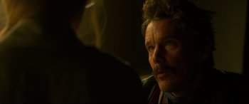 Movie still from “Stockholm” (2018), directed by Robert Budreau – A person with a beard and mustache; Close Up shot, Over the shoulder angle