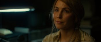 Movie still from “Stockholm” (2018), directed by Robert Budreau – A person wearing a dress shirt; Close Up shot, Over the shoulder angle