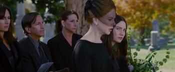 Movie still from “Stoker” (2013), directed by Park Chan-wook – A group of women standing next to each other; Medium shot, Over the shoulder angle