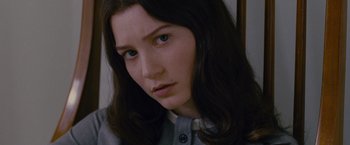 Movie still from “Stoker” (2013), directed by Park Chan-wook – A person with long dark hair; Close Up shot, High angle