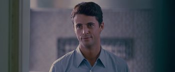 Movie still from “Stoker” (2013), directed by Park Chan-wook – A person wearing a blue shirt; Close Up shot, Over the shoulder angle