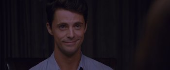 Movie still from “Stoker” (2013), directed by Park Chan-wook – A person smiling for the camera; Close Up shot, Over the shoulder angle