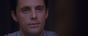 Movie still from “Stoker” (2013), directed by Park Chan-wook – A man's eyes and face; Close Up shot, Over the shoulder angle