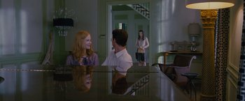 Movie still from “Stoker” (2013), directed by Park Chan-wook – Two women and a man sitting at a piano; Wide shot, Over the shoulder angle