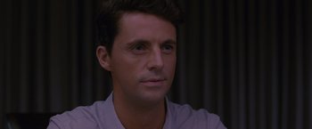 Movie still from “Stoker” (2013), directed by Park Chan-wook – A person wearing a white shirt; Close Up shot, Over the shoulder angle