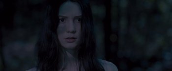 Movie still from “Stoker” (2013), directed by Park Chan-wook – A beautiful young woman with long black hair; Close Up shot, Low angle
