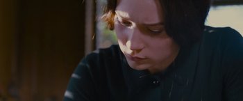 Movie still from “Stoker” (2013), directed by Park Chan-wook – A person looking down at something; Close Up shot, High angle