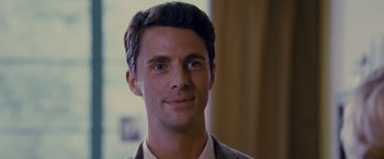 Movie still from “Stoker” (2013), directed by Park Chan-wook – A person wearing a suit and tie; Close Up shot, Over the shoulder angle