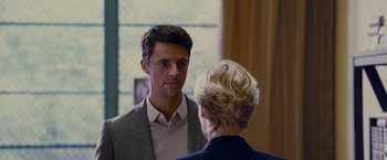 Movie still from “Stoker” (2013), directed by Park Chan-wook – A man and a woman talking to each other; Close Up shot, Over the shoulder angle