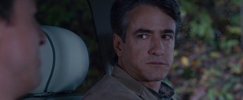 Movie still from “Stoker” (2013), directed by Park Chan-wook – A person in a car looking at the camera; Close Up shot, Over the shoulder angle