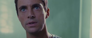 Movie still from “Stoker” (2013), directed by Park Chan-wook – A man's face with blue eyes; Close Up shot, High angle