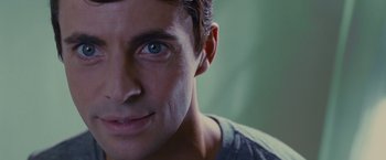 Movie still from “Stoker” (2013), directed by Park Chan-wook – A man's face with blue eyes; Close Up shot, Overhead angle