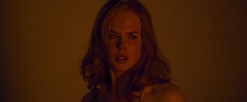 Movie still from “Stoker” (2013), directed by Park Chan-wook – A person with long hair; Close Up shot, Low angle