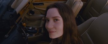 Movie still from “Stoker” (2013), directed by Park Chan-wook – A person sitting in a car; Close Up shot, High angle