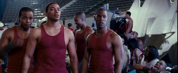 A group of young men standing next to each other