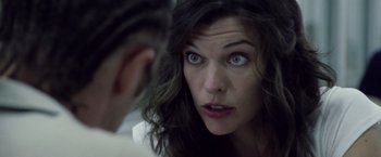 Movie still from “Stone” (2010), directed by John Curran – A person looking at the camera; Close Up shot, Over the shoulder angle