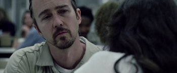 Movie still from “Stone” (2010), directed by John Curran – A person with a beard; Close Up shot, Over the shoulder angle