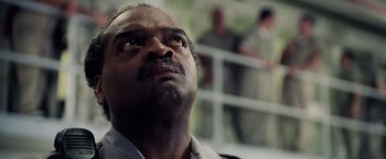 Movie still from “Stone” (2010), directed by John Curran – An older man looking up into the sky; Close Up shot, Low angle