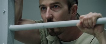 Movie still from “Stone” (2010), directed by John Curran – A person holding a white stick; Close Up shot, Over the shoulder angle