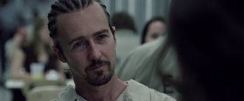 Movie still from “Stone” (2010), directed by John Curran – A person wearing a white shirt; Close Up shot, Low angle