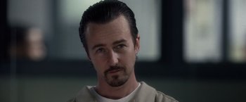 Movie still from “Stone” (2010), directed by John Curran – A person with a beard; Close Up shot, Low angle