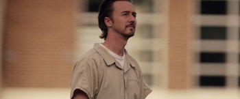 Movie still from “Stone” (2010), directed by John Curran – A person wearing a tan shirt; Close Up shot, Low angle