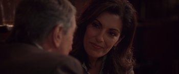 Movie still from “Stone” (2010), directed by John Curran – A person talking to another person; Close Up shot, Over the shoulder angle