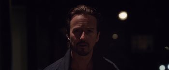 Movie still from “Stone” (2010), directed by John Curran – A person wearing a black shirt; Close Up shot, Low angle